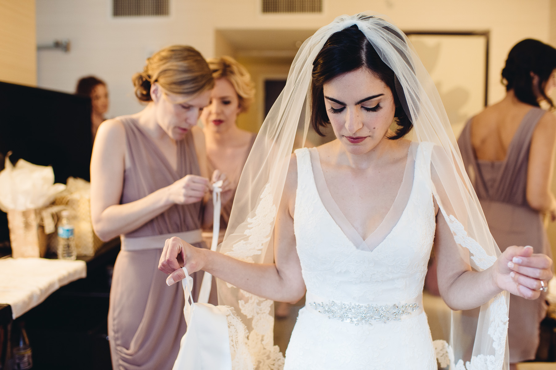 bride getting into dress at Le Meridien Ohiladelphia