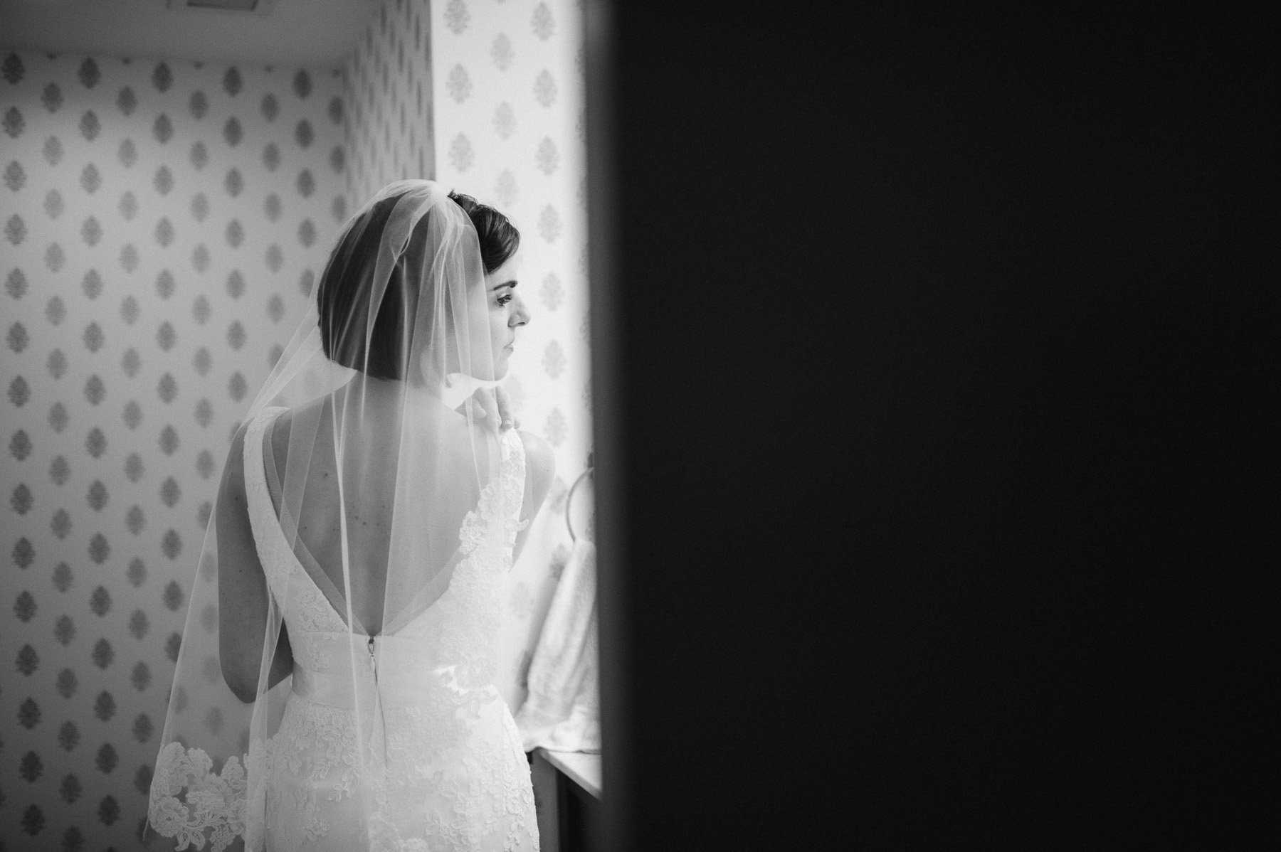 Bride in mirror on wedding day