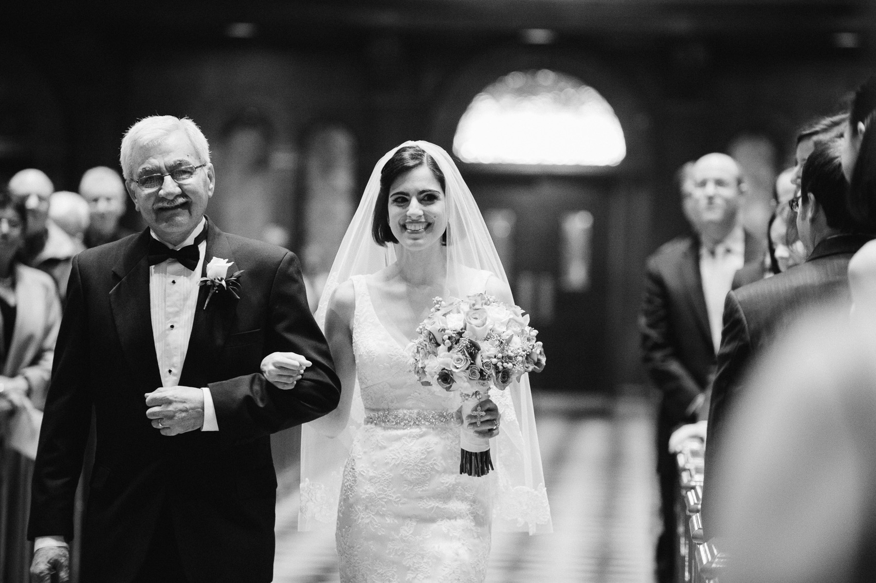 Father walking bride down aisle at the Cathedral Basilica of Sts Peter and Paul