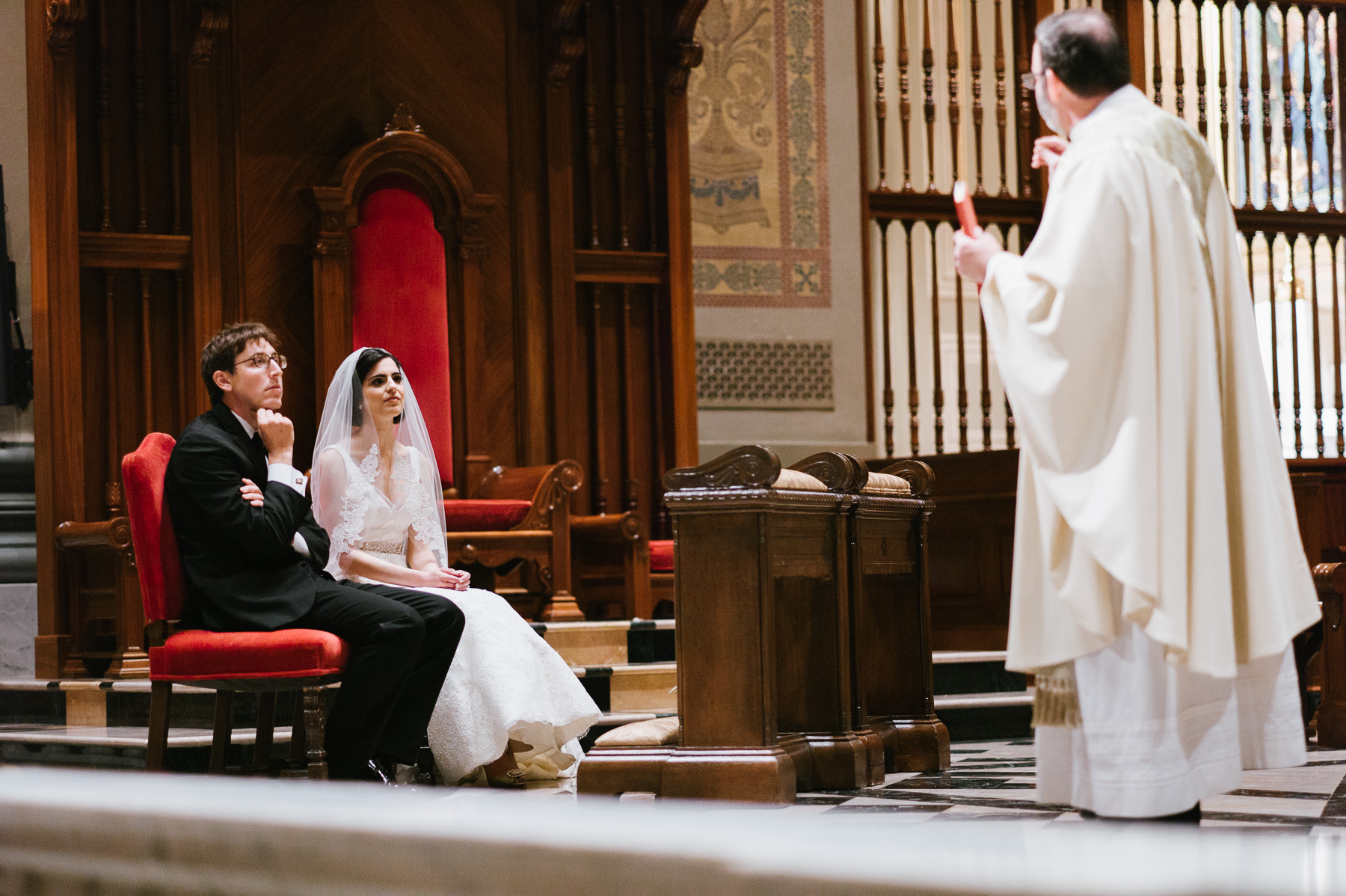 Bride and groom on the alter at The Basilica in Philadelphia